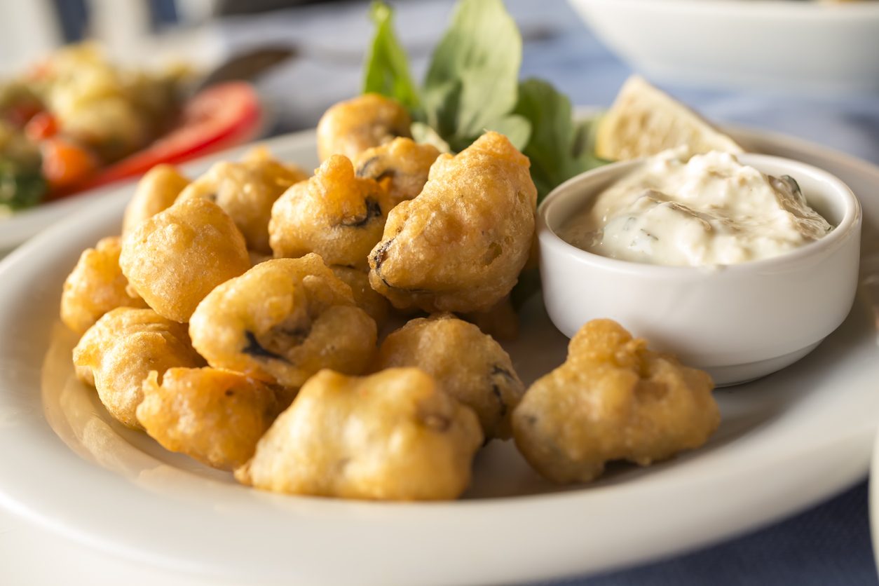 Cena di pesce, le ricette per un menù economico: le cozze fritte