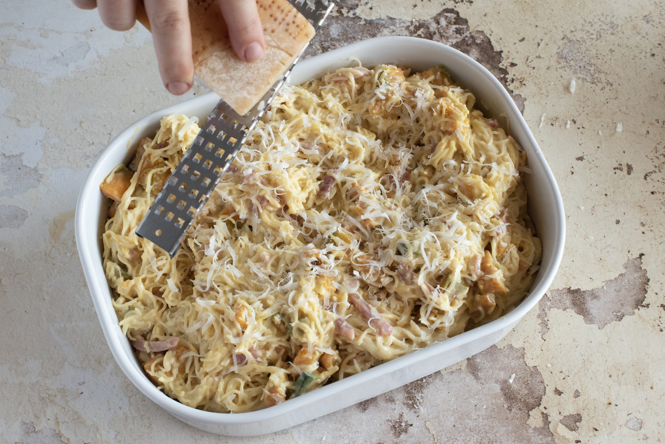 Capellini gratinati la ricetta del primo piatto ricco e dalla doratura