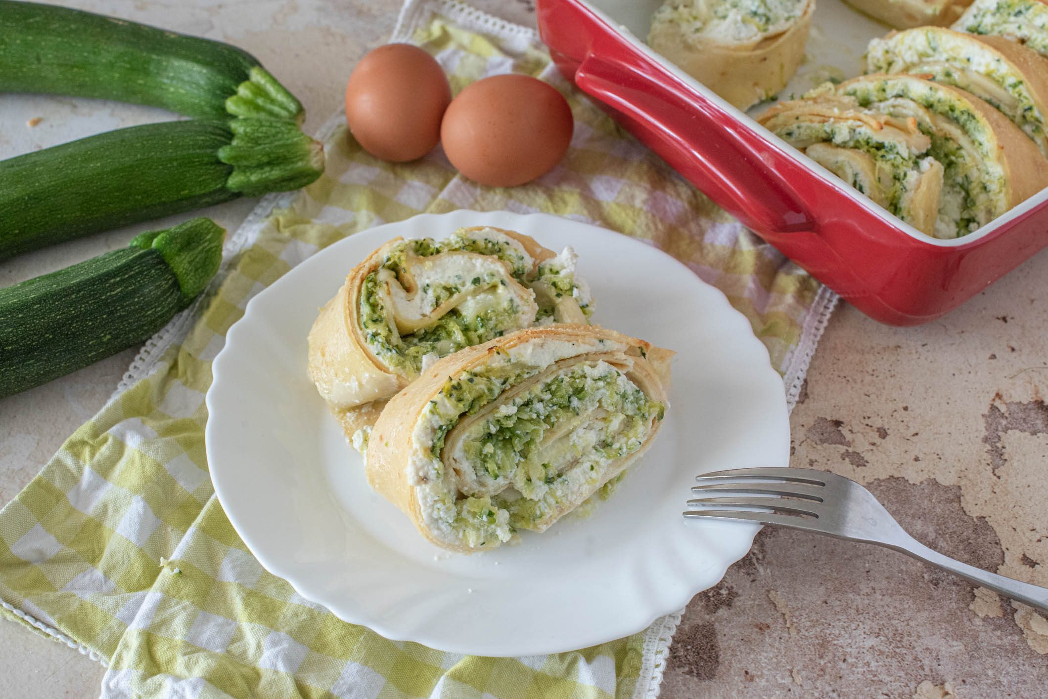 Rotolo di crespelle con zucchine