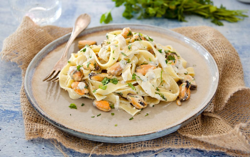 Tagliatelle cacio pepe e cozze